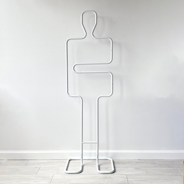 Vintage circa late 20th century (1970-1999) postmodern figural valet. Articulation arm swings from torso and can hold...