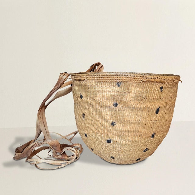 Handwoven by the Yanomami in the 20th century, its broad, beautifully irregular form is made entirely from natural fiber,...