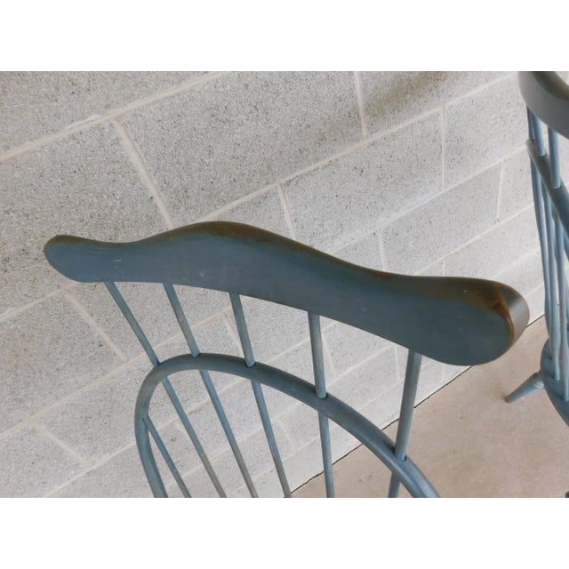 Set of 4 Bow Back High Comb Back Windsor Side Chairs In a distressed robins egg blue, and partially natural wood seat...