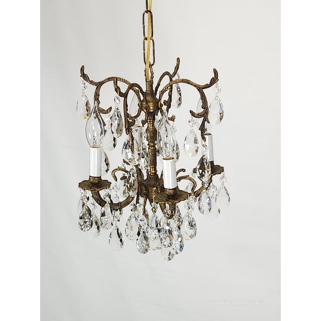 Offered for your consideration is an original Antique 4 Arm 4 Light Lovely Lavish Brass Cut Lead Glass Crystal Chandelier....