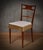 Elegant single chair, from the first half of the last century. All in walnut wood, with a particular design of the...