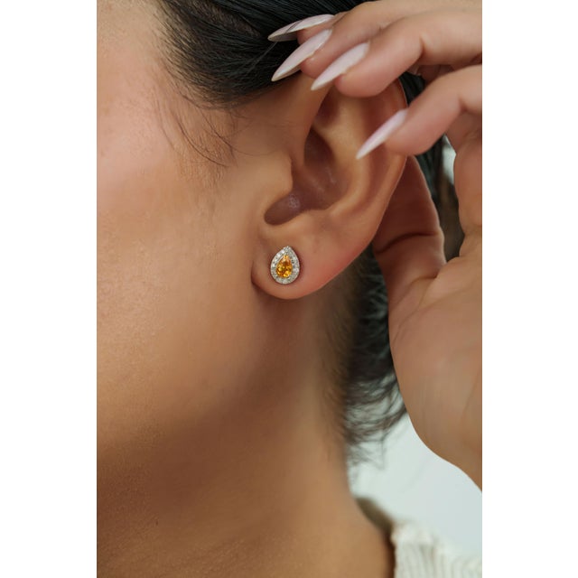 Amber 1 Ct Pear Cut Yellow Sapphire Stud Earrings With Diamonds in 14k Gold- A Pair For Sale - Image 8 of 13