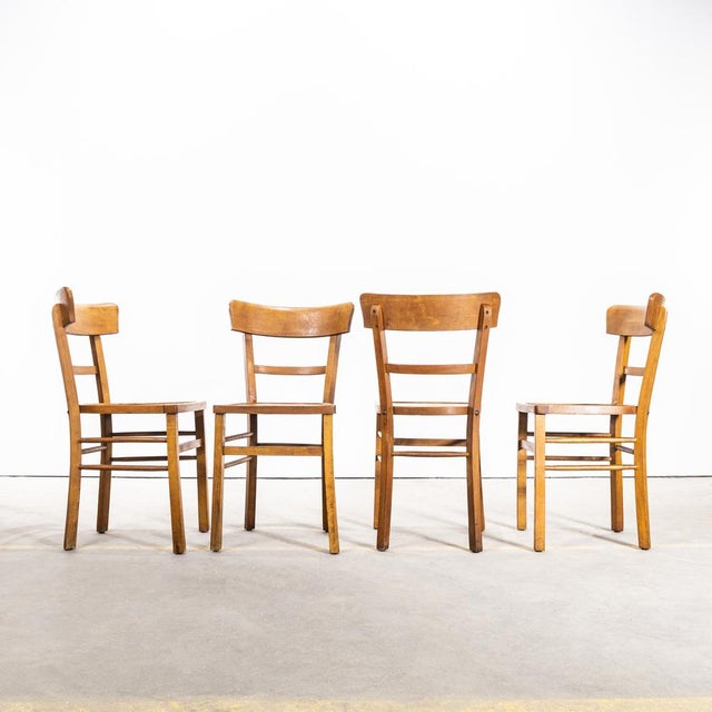 1950’s Simple Warm Oak Bentwood Café Chairs. Classic bistro chair made in France by the maker Baumann. Baumann is a...
