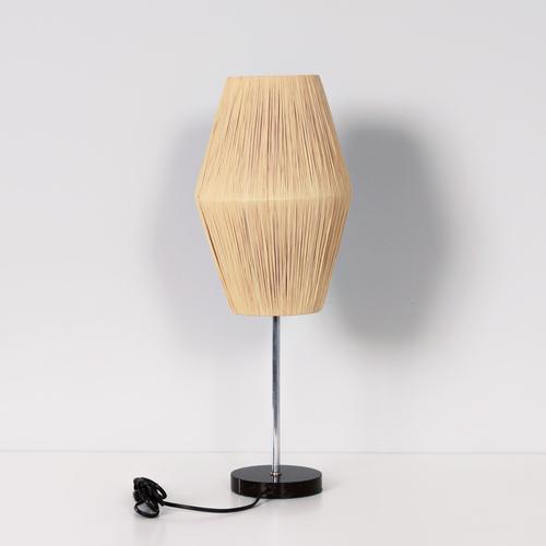Vintage table lamp 1960s with raffia shade and marble base. Provides warm and diffused light and instantly adds atmosphere...