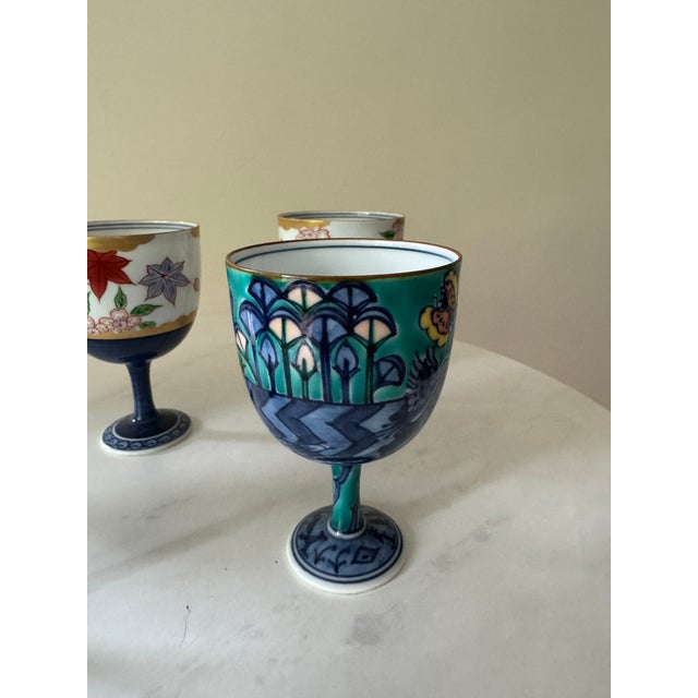 Textile Mid 20th Century Set of 5 Japanese Porcelain Footed Sake Goblets — Hand-Painted, Arita Style — Autumn, Garden & Egyptian Motifs For Sale - Image 7 of 8