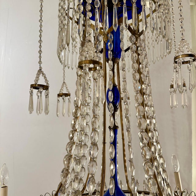 A spectacular Scandinavian Neoclassical six light chandelier from Russia circa 1800. Center baluster, base and top in...