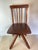 A charming vintage rustic industrial child's swivel chair featuring solid hardwood construction paired with durable cast...