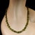 This elegant 22‑inch African peridot nugget necklace showcases the vibrant, refreshing beauty of genuine peridot in its...