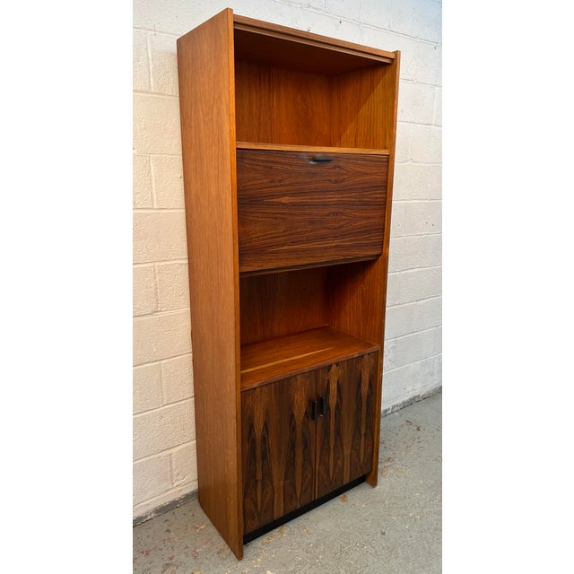 Make a sophisticated statement with this Vintage Danish Mid-Century Modern Rosewood Bar Cabinet, a beautifully crafted...