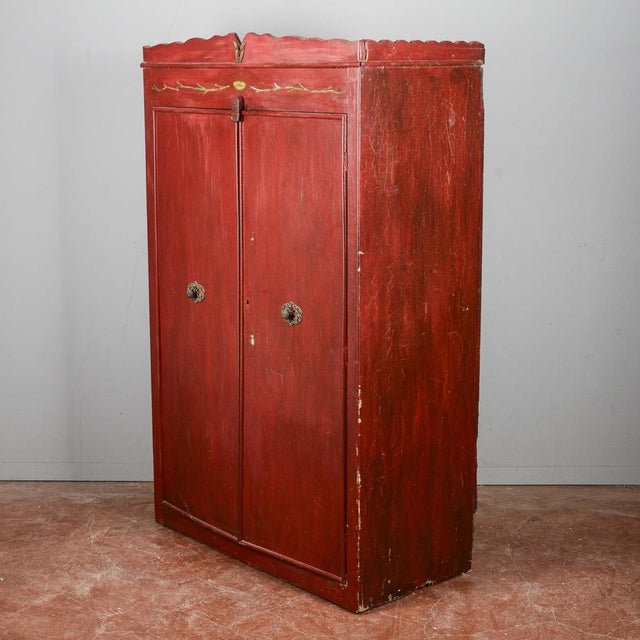 This charming painted wardrobe represents a distinctive example of arte povera and vintage rustic furniture, perfect for...