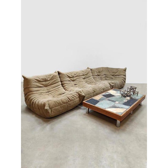 To go or not Togo. This vintage Togo lounge set in earthy tones is an absolute eye-catcher. Consisting of a corner...