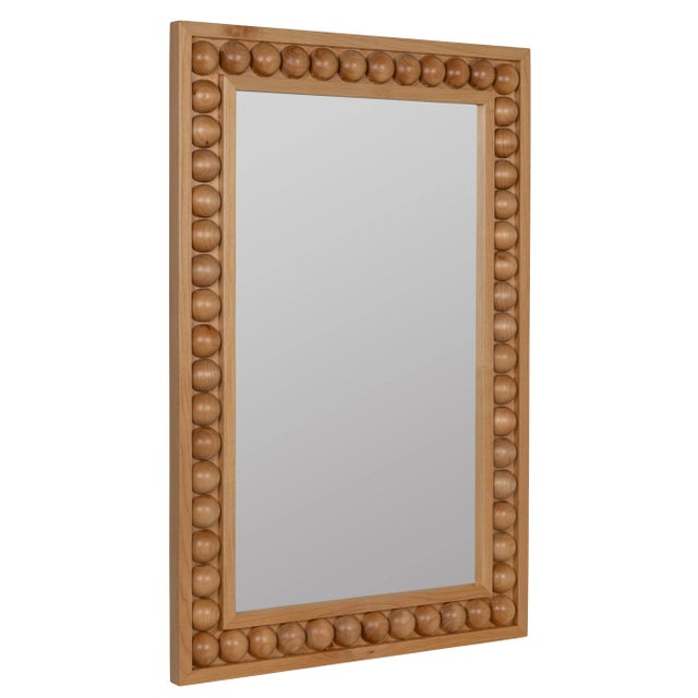 The beautiful Brayden wall mirror features an intricate hand-crafted frame & finish. This piece is sure to add a statement...