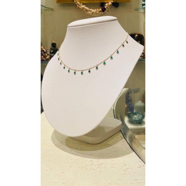Emerald Necklace in 18K Gold studded with pear cut emerald pieces. This is a great bridesmaid, wedding or christmas gift...
