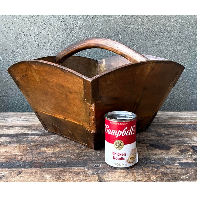 This exceptional antique primitive wood basket is a soulful artifact of late 19th-century utilitarian craftsmanship. Hand-...