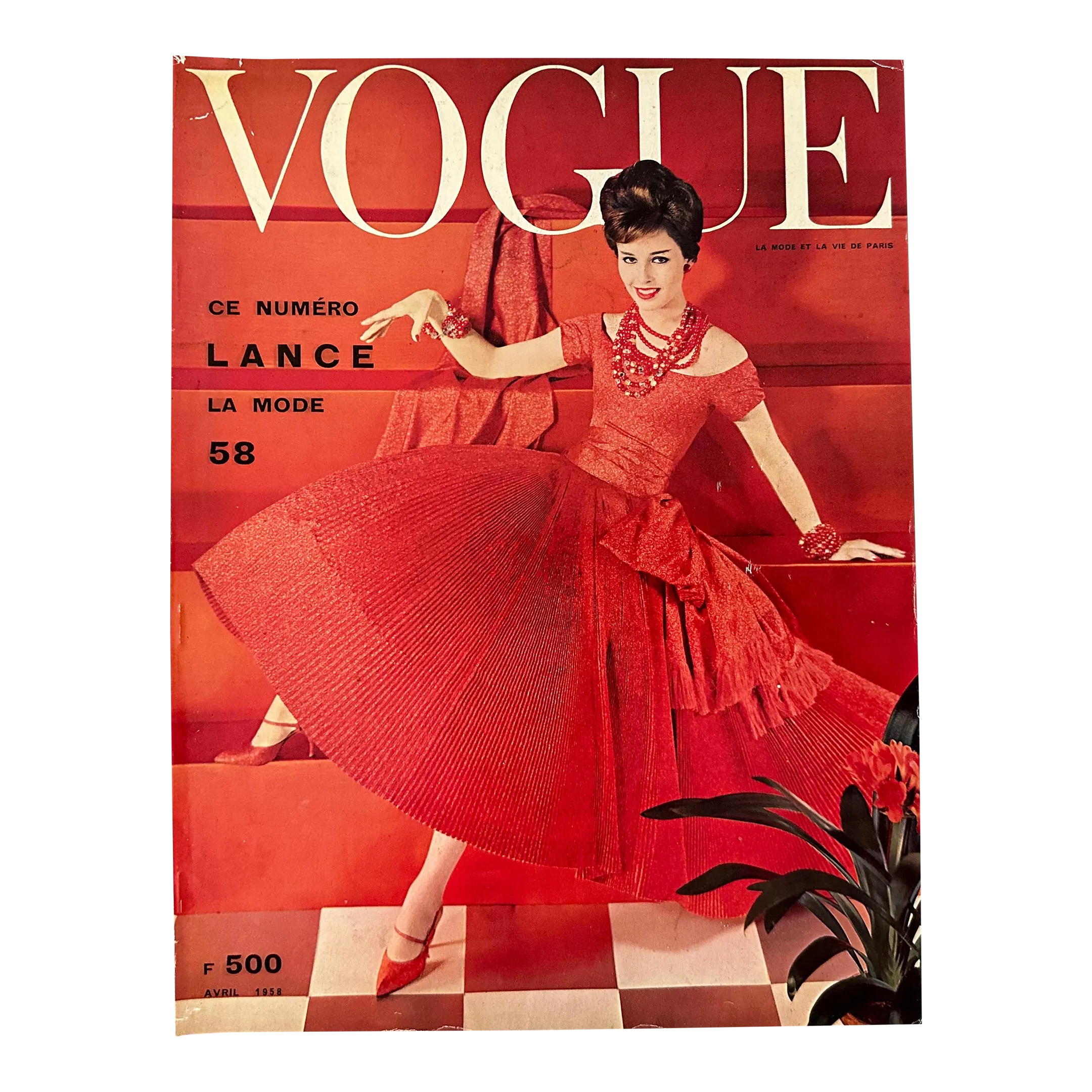 cover of vogue red dress Taylor Swift smoulders in a red Saint Laurent dress on the front cover of  British Vogue