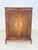 Eegant Chippendale wardrobe from the 1960s in classic German design. This piece of furniture impresses with its timeless...