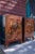 A rare matching pair of 19th-century Chinese red lacquer cabinets, beautifully decorated with hand-painted gilt scenes...