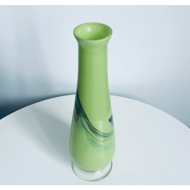 Beautiful mid-century modern Italian Murano Venetian hand blown art glass vase. Classic footed form in pistachio green...