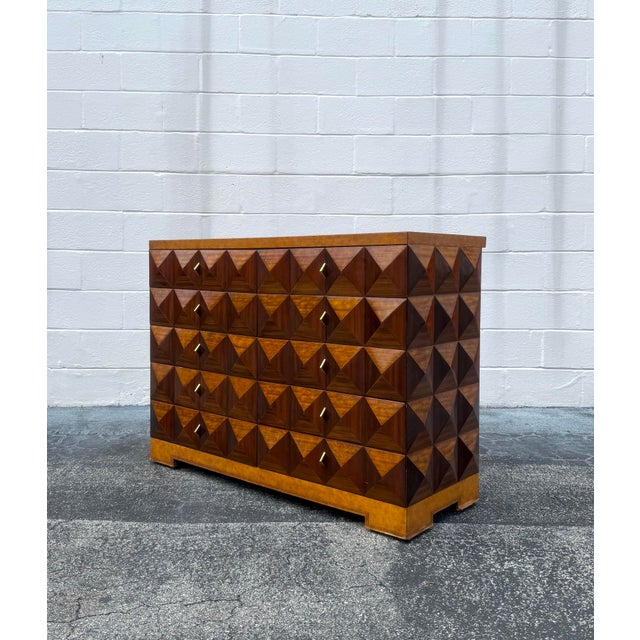 A sculptural statement in craftsmanship and form, this vintage Maitland-Smith chest features a richly inlaid pyramidal...