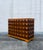 A sculptural statement in craftsmanship and form, this vintage Maitland-Smith chest features a richly inlaid pyramidal...