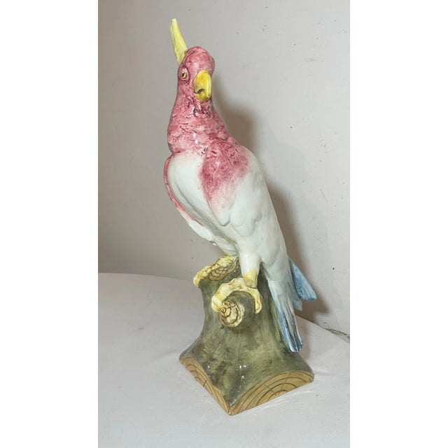 Up for sale is a wonderful antique handmade Czechoslovakian painted pottery cockatoo statue. It's done with a realistic...
