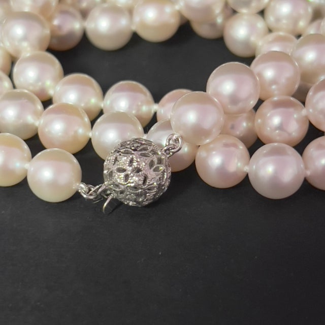 Fine Quality 8.5-8 mm Japanese Akoya Pearl Diamond Necklace with 22" in length and an 18k Gold clasp Certified $4,950...