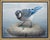This oil painting depicts a blue jay perched on a smooth stone, intently observing a small clover sprouting nearby. The...