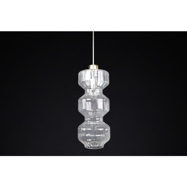 Mid-century modern glass and brass pendants, bohemia, czechoslovakia, 1970s (10 available): these elegant mid-century...