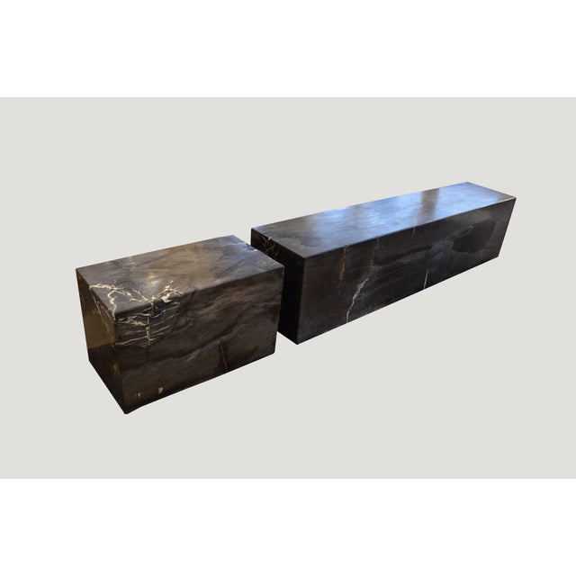 High quality petrified wood log bench. Stunning charcoal grey, black and white tones paired with the scale make this an...