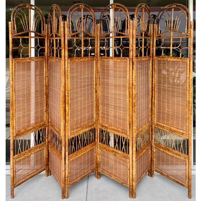 Stunning burnt bamboo room divider from 70's. Elegant and timeless British Colonial style. Large and light weight. Each...