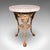 This is a vintage Britannia table. An English, pine and cast iron garden drinks table in Victorian revival taste, dating...