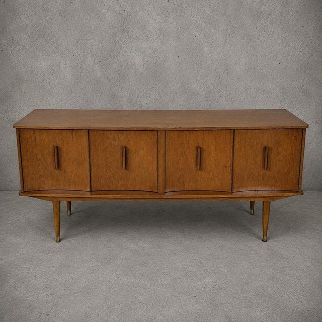 Details * Maker: Argosy Furniture * Era: Mid-century modern, circa 1960s * Materials: Solid teak and teak veneer *...