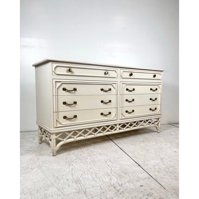 Vintage Ficks Reed 60" long Rattan Dresser. 8 drawer long dresser, solid wood construction with rattan trim. Woven pencil...