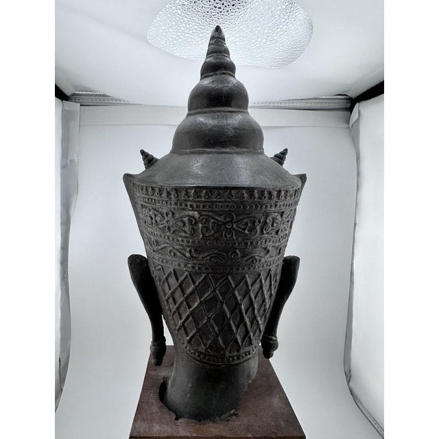 Ebony Vintage Bronze Crowned Buddha Head in Thai Ayutthaya Style. Wood Base Sculpture For Sale - Image 8 of 11