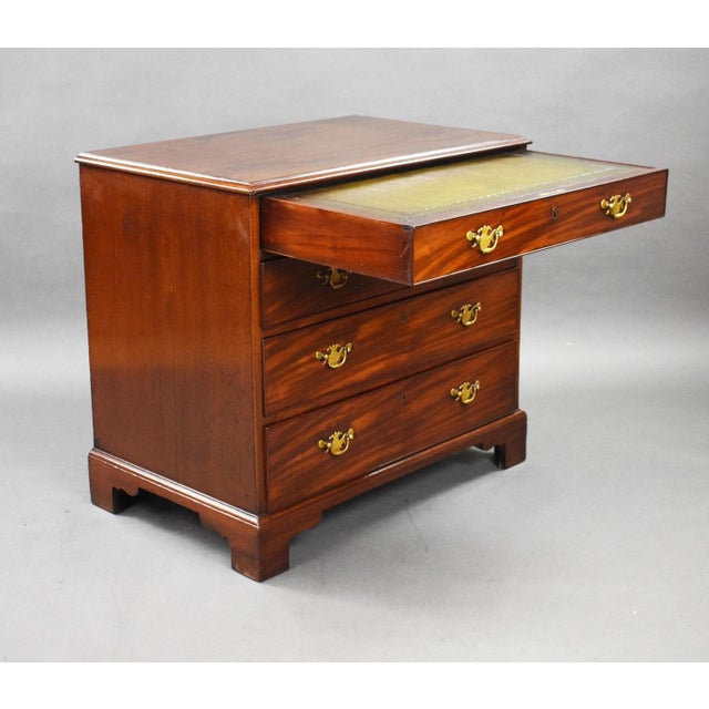 A good quality George II mahogany dressing chest of drawers, with four graduated oak lined drawers, the uppermost fitted...