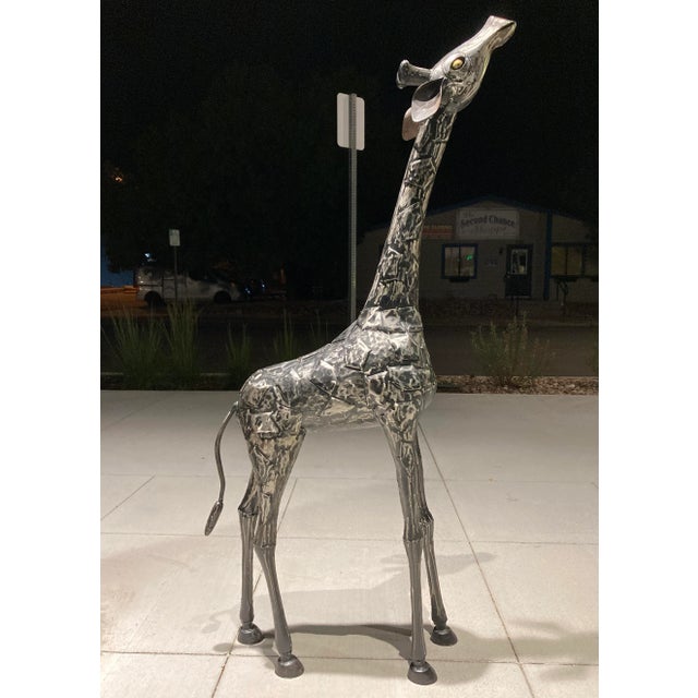 20th century baby giraffe sculpture in patchwork metal, welded, handcrafted, hand painted, very nice piece, circa mid to...
