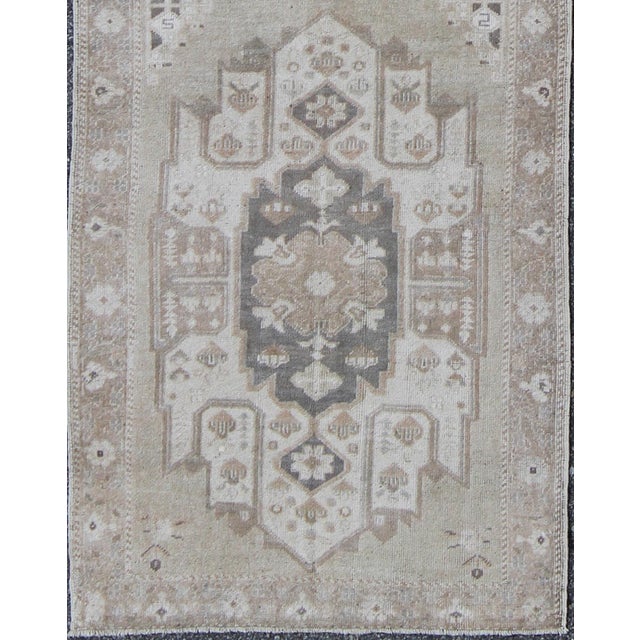 Measures: 3'1 x 11'4. Turkish Oushak Runner with Central Medallion Design in Taupe, Charcoal and Gray. Keivan Woven Arts /...