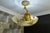 Early 20th-century french alabaster bowl chandelier with sculptural bronze details and classical proportions. elegant...