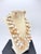 This vintage Vendôme demi‑parure from the late 1950s–early 1960s features high‑quality glass beads in mixed textures and...