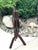 Antique Mahogany, Double-Sided, Rotating Magazine/Book/Sheet Music Carrier, With Intricately Carved Fretwork Panels, Turned Handle and a Tripod Column For Sale - Image 10 of 12