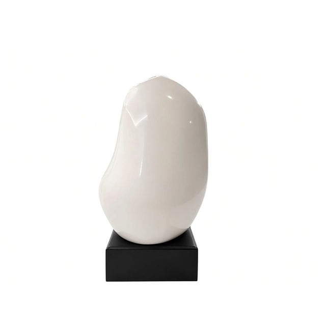 Quick Hits Artist: Edith Kolton Style: Minimalist, Modernist, Biomorphic Materials: Glazed ceramic in a glossy white...