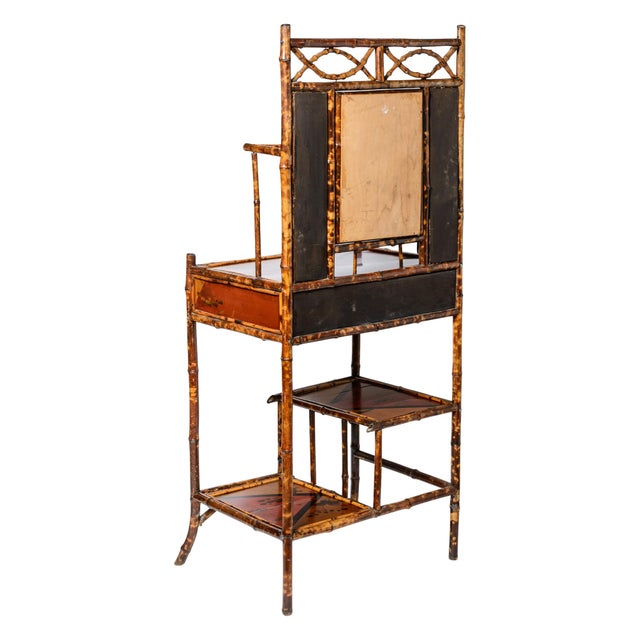Just in this striking piece of 19th-century English Aesthetic Movements considered more like a mirrored hall stand, it...