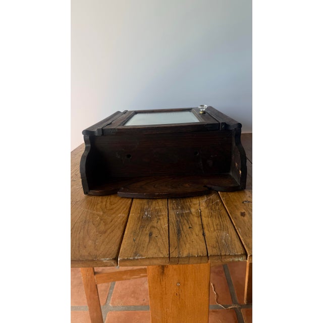 1910s Antique Industrial Oak Storage Cabinet With Ontario Laundry Beveled Mirror For Sale - Image 5 of 9