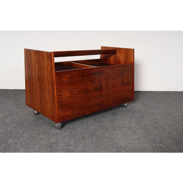 Mid-Century Norwegian Modern double magazine rack designed in the 1960s by Rolf Hesland for Bruksbo. Boasts exquisite...