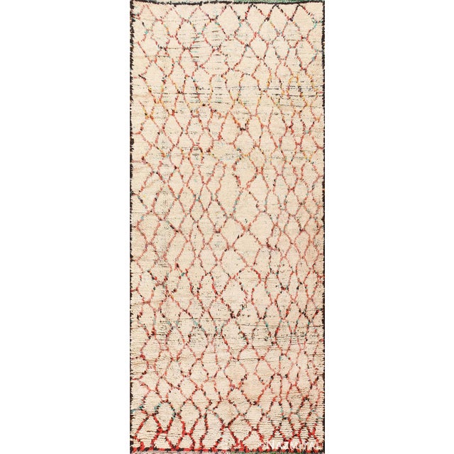 An energetic vintage carpet, this mid-century Moroccan rug is an excellent example of the timeless allure of color and...