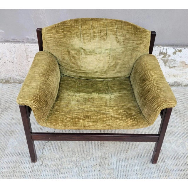 A refined armchair designed by Tito Agnoli in the 1960s for Cinova. This model features clean, elegant lines. An iconic...