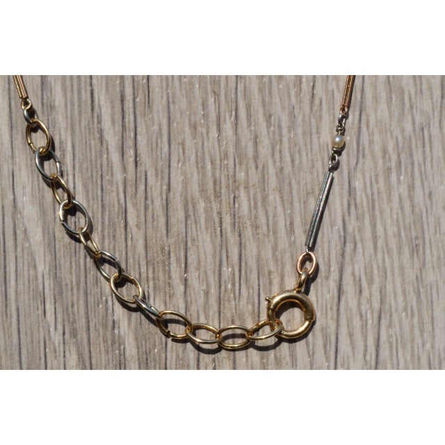 The Glendale: Antique Rose Gold and White Gold Chain with Seed Pearls. The chain features alternating sections of white...