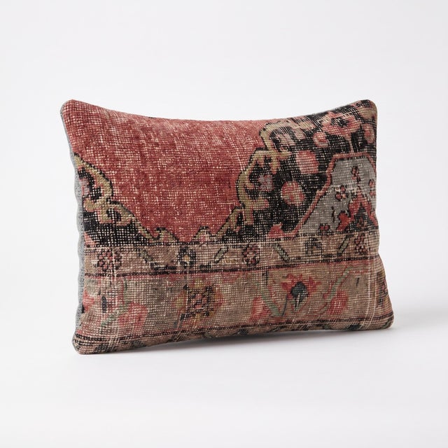 This beautiful 16'' x 24'' pillow cover was made from an authentic Turkish rug. Bright colors of wool adorn the front of...