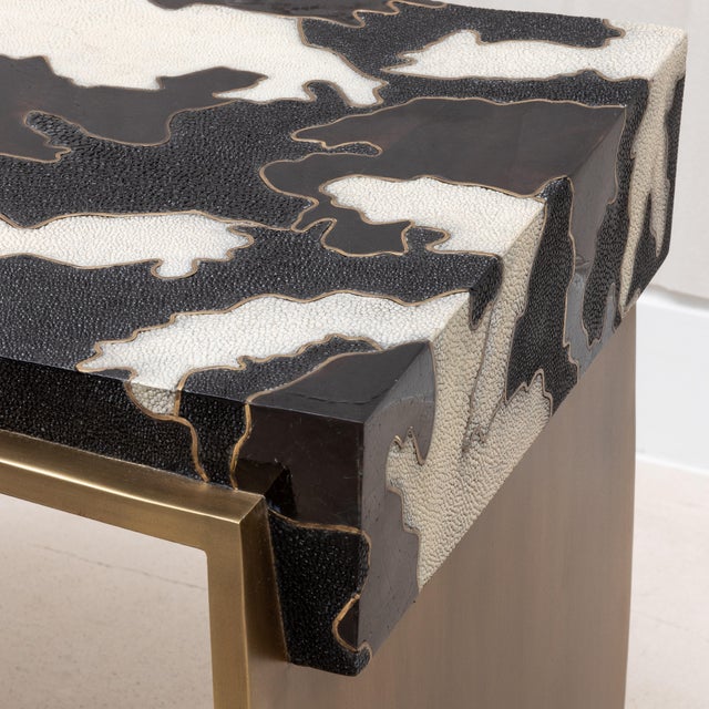 The Laurens Camo Stool by R&Y Augousti is a stunning blend of artistry and function, crafted to be a statement piece in...