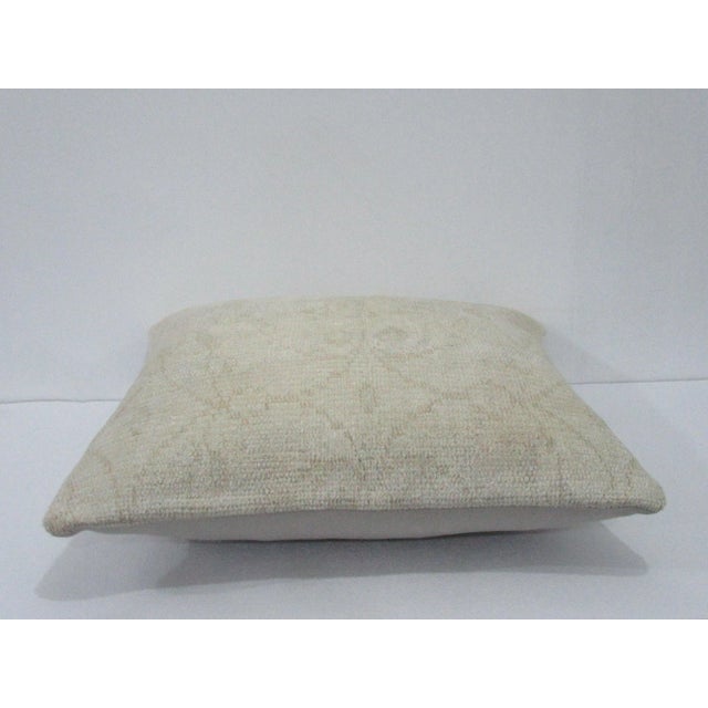 Decorative pillow cover made from a vintage Turkish handknotted rug. Backed with good quality cotton fabric. Pillow...